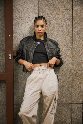 Photo of a young woman in Adidas attire shot in the subway of Munich, fashion editorial for About You by Philipp Messer 