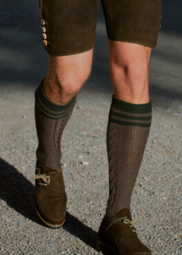 Close up of a young man in traditional German Bavarian Tracht, fashion editorial for Lodenfrey by Philipp Messer 