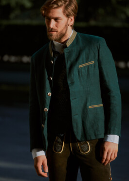 Photo of a young man in traditional German Bavarian Tracht, fashion editorial for Lodenfrey by Philipp Messer 