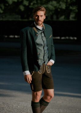 Photo of a young man in traditional German Bavarian Tracht, fashion editorial for Lodenfrey by Philipp Messer 