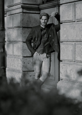 Photo of a young man in traditional German Bavarian Tracht, fashion editorial for Lodenfrey by Philipp Messer 