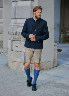 Photo of a young man in traditional German Bavarian Tracht, fashion editorial for Lodenfrey by Philipp Messer 